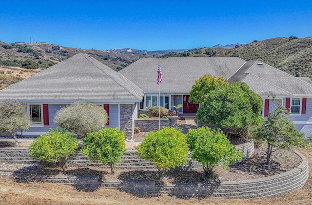 single story home with a mountain view