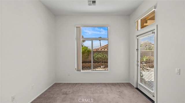 view of carpeted spare room