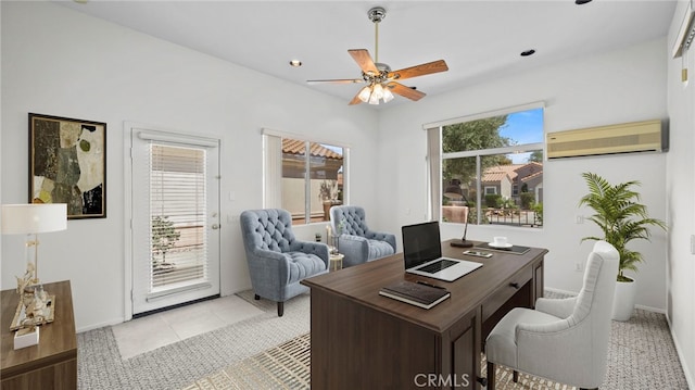 tiled office featuring a wall unit AC and ceiling fan