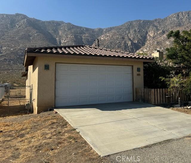 garage featuring a mountain view