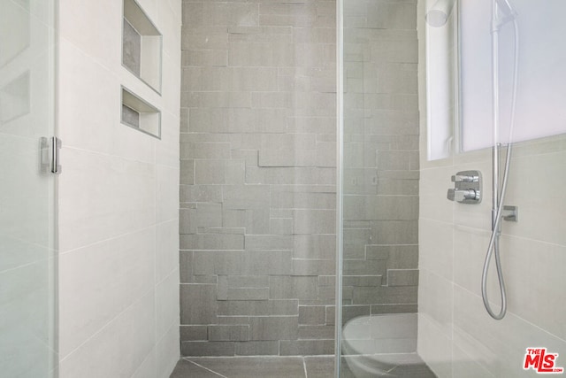 bathroom with an enclosed shower