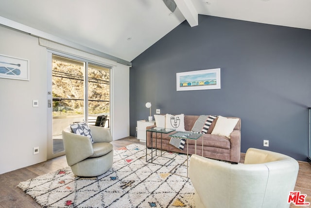 living room with lofted ceiling with beams and wood-type flooring