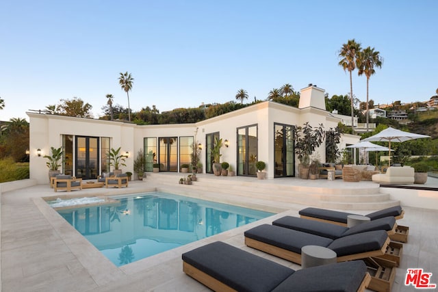 view of pool with an outdoor hangout area and a patio area