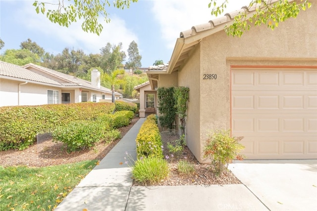 view of home's exterior with a garage