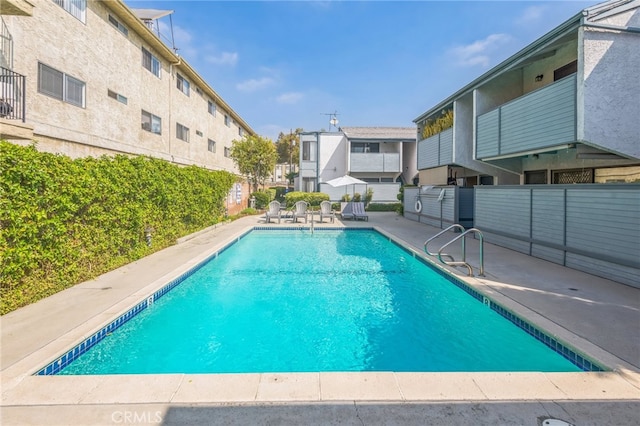 view of pool featuring a patio