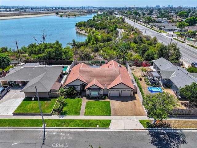 bird's eye view with a water view