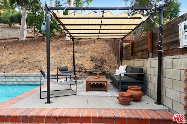 view of patio / terrace with a pergola and an outdoor hangout area