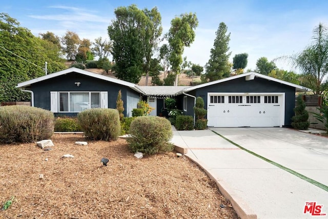 ranch-style home with a garage