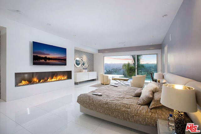 bedroom with light tile patterned floors