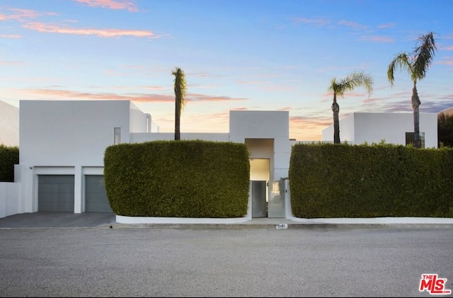 contemporary home featuring a garage