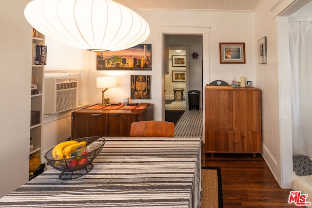 interior space featuring crown molding and dark hardwood / wood-style flooring