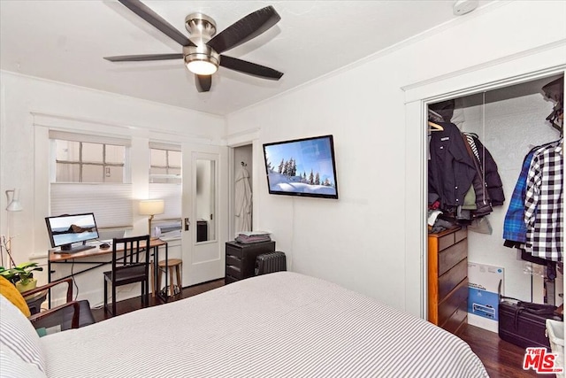 bedroom featuring ornamental molding and dark hardwood / wood-style floors