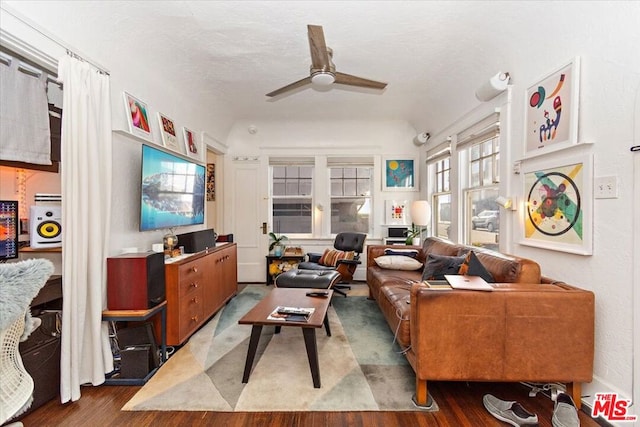 living room with hardwood / wood-style flooring and ceiling fan