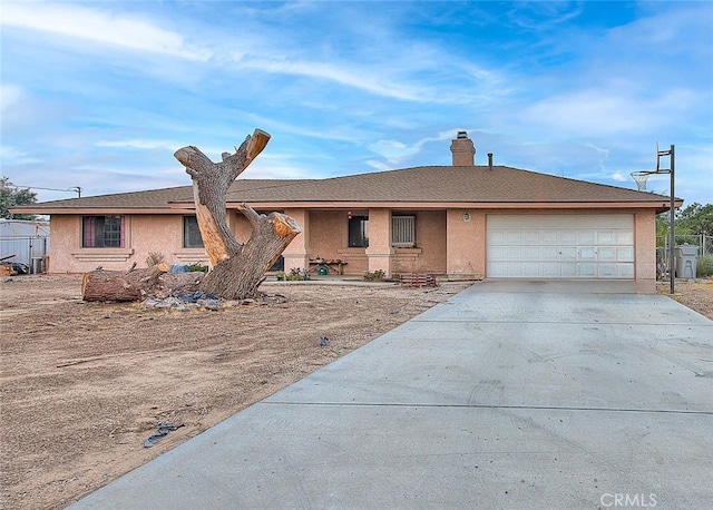 ranch-style house featuring a garage