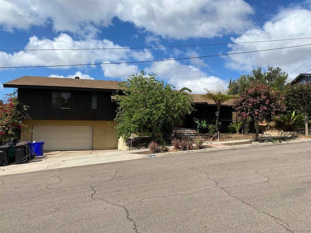 view of front of property featuring a garage