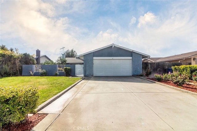 ranch-style home with a garage and a front yard