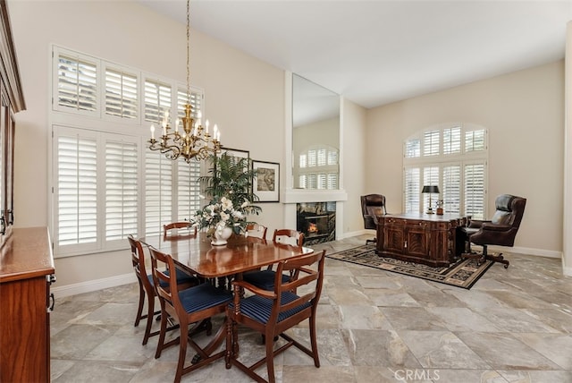 dining space with a chandelier and a wealth of natural light