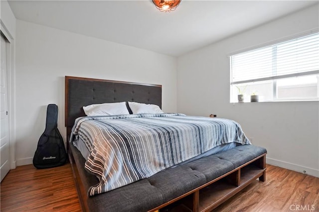 bedroom featuring hardwood / wood-style flooring