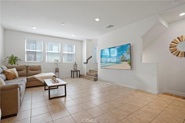 living room with light tile patterned floors