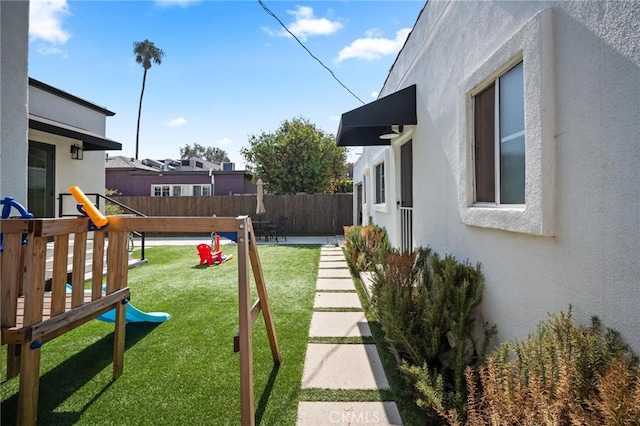 view of yard featuring a playground