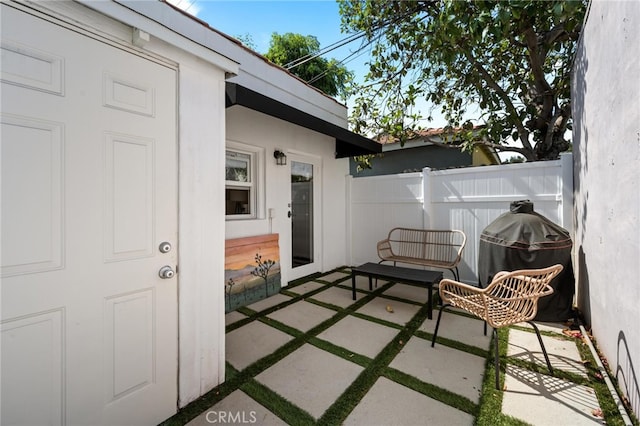 view of patio with a grill