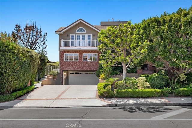 front of property with a garage