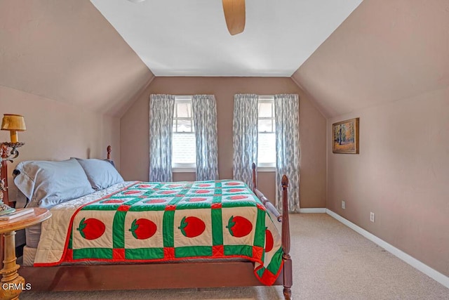 bedroom with ceiling fan, carpet, and lofted ceiling