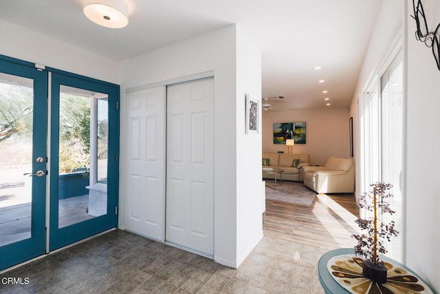 entryway featuring hardwood / wood-style floors and ceiling fan