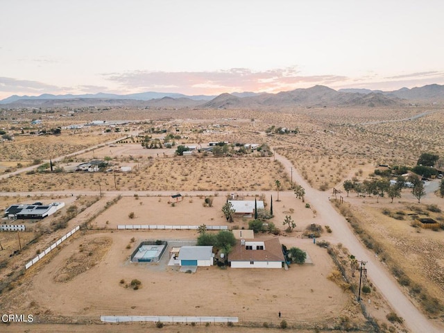 aerial view at dusk with a mountain view