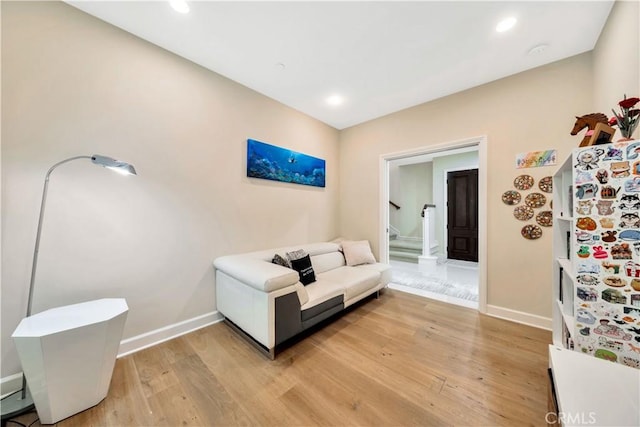 living room with light hardwood / wood-style floors