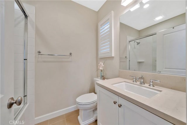 full bathroom featuring shower / bath combination with glass door, tile patterned floors, toilet, and vanity