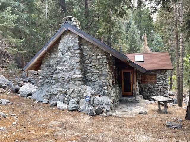 view of log cabin