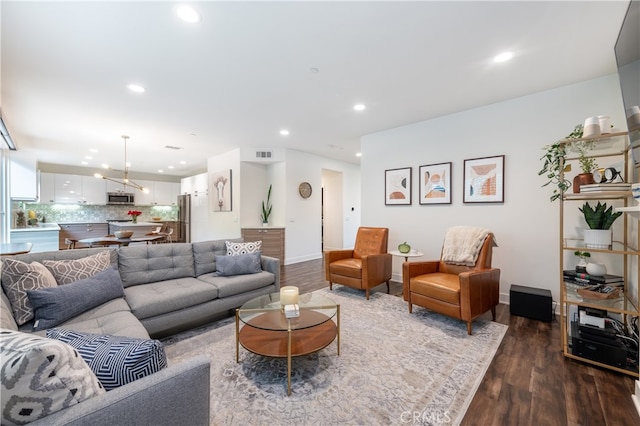 living room with hardwood / wood-style floors