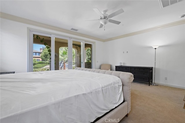 bedroom featuring access to exterior, french doors, ornamental molding, light colored carpet, and ceiling fan