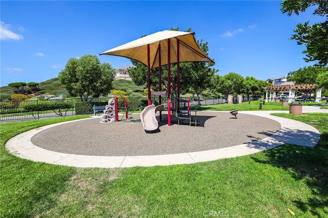 view of playground featuring a lawn