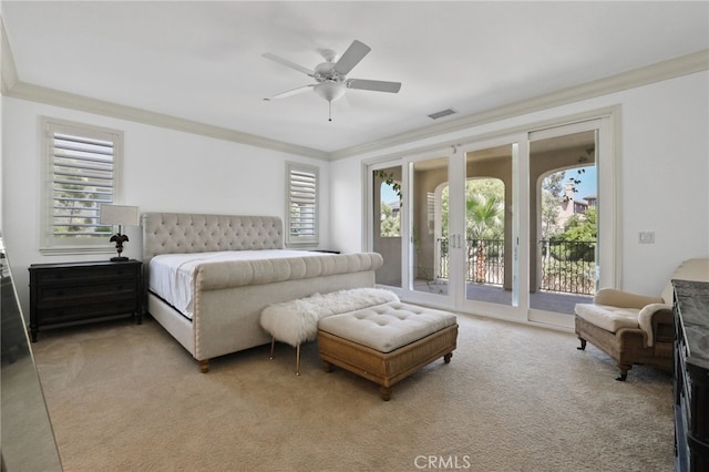 carpeted bedroom featuring access to exterior, ceiling fan, and ornamental molding