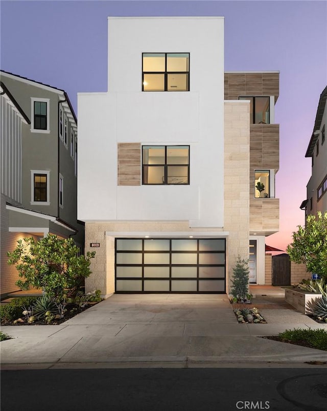 modern home featuring a garage