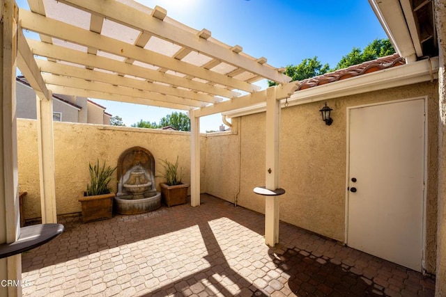 view of patio / terrace featuring a pergola