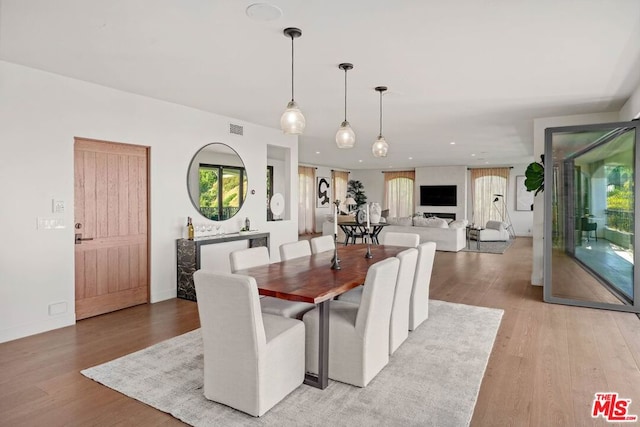 dining room featuring light hardwood / wood-style floors