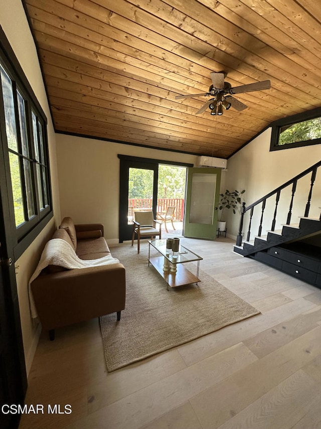 living room with wood ceiling, lofted ceiling, ceiling fan, and light hardwood / wood-style flooring