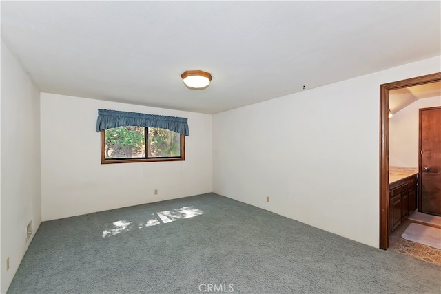 unfurnished room featuring carpet floors