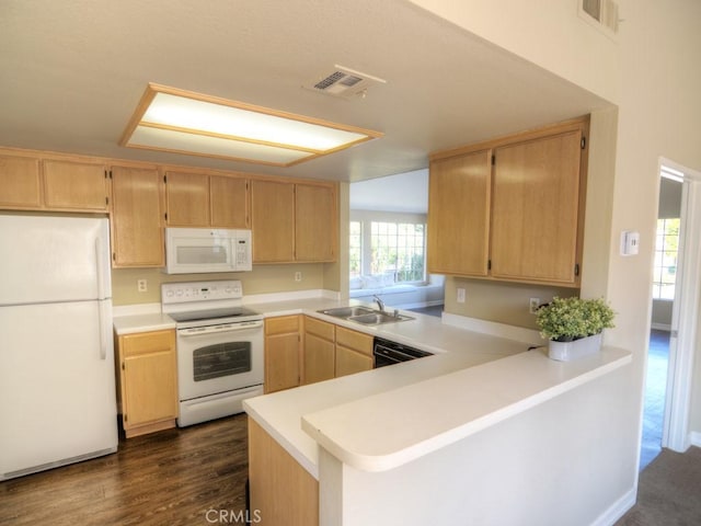 kitchen with kitchen peninsula, light brown cabinetry, dark hardwood / wood-style flooring, white appliances, and sink