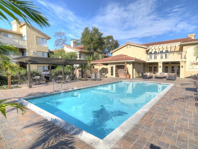 view of pool featuring a patio area