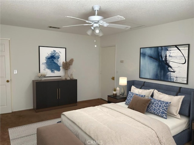 bedroom with ceiling fan, dark carpet, and a textured ceiling