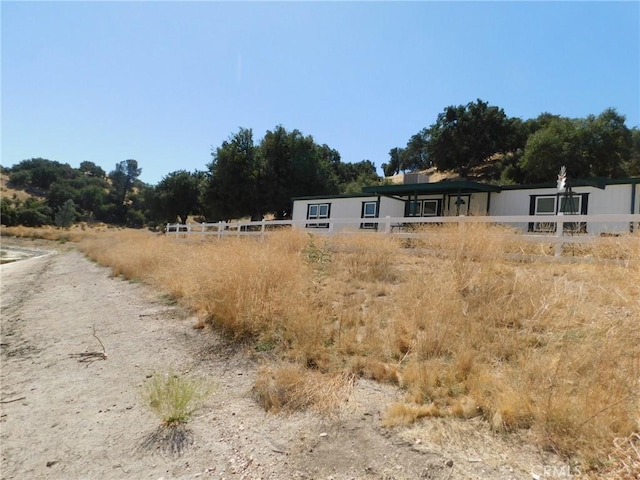 exterior space with a rural view