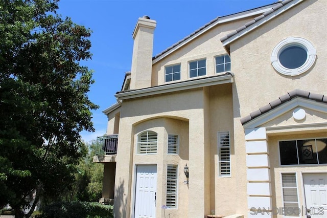 exterior space featuring a balcony