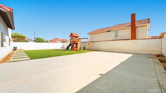 view of patio / terrace featuring a playground