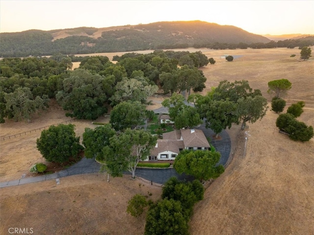 aerial view at dusk with a mountain view