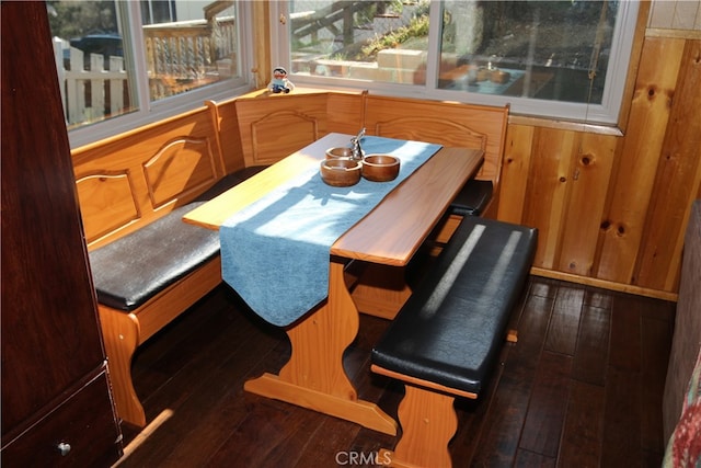 dining area featuring dark hardwood / wood-style floors