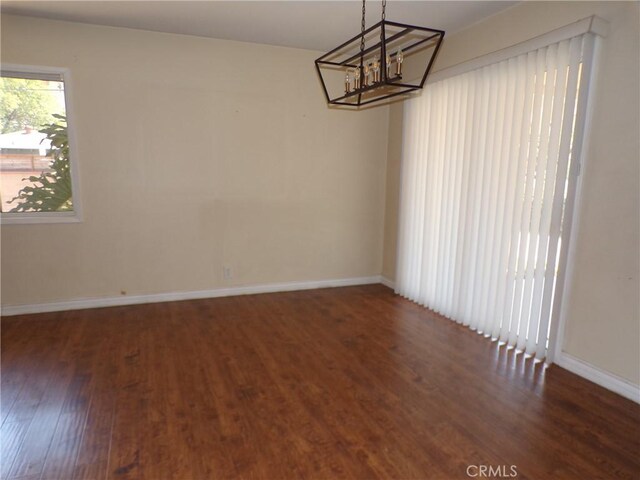 4066 Tenango Rd, Claremont, CA 91711 - empty room featuring wood finished floors, a notable chandelier, and baseboards